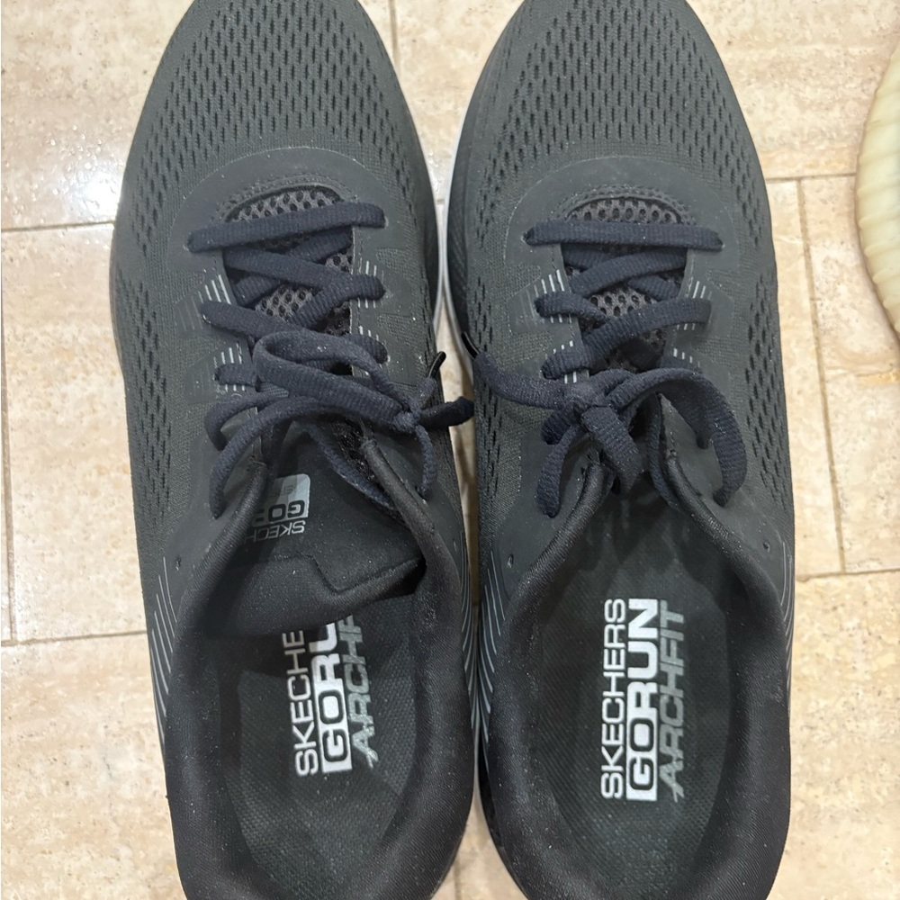 Skechers Black Athletic Shoes with Mesh Upper and Lace-Up Design